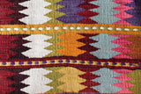 Vintage kilim rug in room decor setting, old rug, antique rug, pastel colors, faded colors, Turkish rug, vintage rug, soft rug, Portland, Oregon, rug store, rug shop, local shop,  antique kilim rug, bold colors, bright colors, faded colors