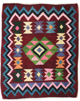 Vintage kilim rug in living room setting, bright colors, wild shaman, soft rug, bold color, Portland, Oregon, rug store, rug shop, local shop, vintage rug, modern kilim, warm colors, antique rug, antique kilim