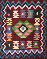 Vintage kilim rug in living room setting, bright colors, wild shaman, soft rug, bold color, Portland, Oregon, rug store, rug shop, local shop, vintage rug, modern kilim, warm colors, antique rug, antique kilim