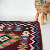 Vintage kilim rug in living room setting, bright colors, wild shaman, soft rug, bold color, Portland, Oregon, rug store, rug shop, local shop, vintage rug, modern kilim, warm colors, antique rug, antique kilim