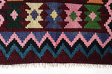 Vintage kilim rug in living room setting, bright colors, wild shaman, soft rug, bold color, Portland, Oregon, rug store, rug shop, local shop, vintage rug, modern kilim, warm colors, antique rug, antique kilim