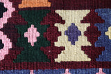 Vintage kilim rug in living room setting, bright colors, wild shaman, soft rug, bold color, Portland, Oregon, rug store, rug shop, local shop, vintage rug, modern kilim, warm colors, antique rug, antique kilim