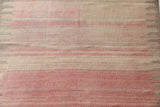 Vintage kilim rug in living room setting, old rug, antique rug, pastel colors, faded colors, Turkish rug, vintage rug, soft rug, Portland, Oregon, rug store, rug shop, local shop, earthy tones, earthy colors, warm colors