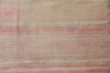 Vintage kilim rug in living room setting, old rug, antique rug, pastel colors, faded colors, Turkish rug, vintage rug, soft rug, Portland, Oregon, rug store, rug shop, local shop, earthy tones, earthy colors, warm colors