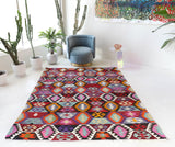 Vintage kilim rug in living room setting, bright colors, wild shaman, soft rug, bold color, Portland, Oregon, rug store, rug shop, local shop, vintage rug, modern kilim, warm colors
