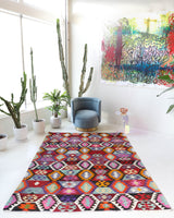 Vintage kilim rug in living room setting, bright colors, wild shaman, soft rug, bold color, Portland, Oregon, rug store, rug shop, local shop, vintage rug, modern kilim, warm colors