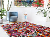 Vintage kilim rug in living room setting, bright colors, wild shaman, soft rug, bold color, Portland, Oregon, rug store, rug shop, local shop, vintage rug, modern kilim, warm colors