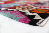 Vintage kilim rug in living room setting, bright colors, wild shaman, soft rug, bold color, Portland, Oregon, rug store, rug shop, local shop, vintage rug, modern kilim, warm colors