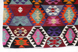 Vintage kilim rug in living room setting, bright colors, wild shaman, soft rug, bold color, Portland, Oregon, rug store, rug shop, local shop, vintage rug, modern kilim, warm colors