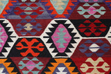 Vintage kilim rug in living room setting, bright colors, wild shaman, soft rug, bold color, Portland, Oregon, rug store, rug shop, local shop, vintage rug, modern kilim, warm colors