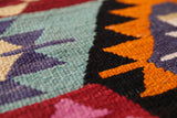 Vintage kilim rug in living room setting, bright colors, wild shaman, soft rug, bold color, Portland, Oregon, rug store, rug shop, local shop, vintage rug, modern kilim, warm colors