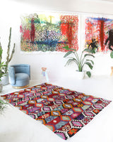 Vintage kilim rug in living room setting, bright colors, wild shaman, soft rug, bold color, Portland, Oregon, rug store, rug shop, local shop, vintage rug, modern kilim, warm colors