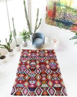 Vintage kilim rug in living room setting, bright colors, wild shaman, soft rug, bold color, Portland, Oregon, rug store, rug shop, local shop, vintage rug, modern kilim, warm colors
