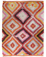 Vintage kilim rug in room decor setting, old rug, antique rug, pastel colors, faded colors, Turkish rug, vintage rug, soft rug, Portland, Oregon, rug store, rug shop, local shop,  antique kilim rug, bold colors, bright colors, faded colors