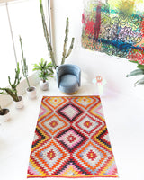 Vintage kilim rug in room decor setting, old rug, antique rug, pastel colors, faded colors, Turkish rug, vintage rug, soft rug, Portland, Oregon, rug store, rug shop, local shop,  antique kilim rug, bold colors, bright colors, faded colors