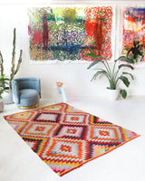 Vintage kilim rug in room decor setting, old rug, antique rug, pastel colors, faded colors, Turkish rug, vintage rug, soft rug, Portland, Oregon, rug store, rug shop, local shop,  antique kilim rug, bold colors, bright colors, faded colors