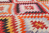 Vintage kilim rug in room decor setting, old rug, antique rug, pastel colors, faded colors, Turkish rug, vintage rug, soft rug, Portland, Oregon, rug store, rug shop, local shop,  antique kilim rug, bold colors, bright colors, faded colors