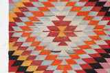 Vintage kilim rug in room decor setting, old rug, antique rug, pastel colors, faded colors, Turkish rug, vintage rug, soft rug, Portland, Oregon, rug store, rug shop, local shop,  antique kilim rug, bold colors, bright colors, faded colors