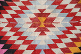 Vintage kilim rug in room decor setting, old rug, antique rug, pastel colors, faded colors, Turkish rug, vintage rug, soft rug, Portland, Oregon, rug store, rug shop, local shop,  antique kilim rug, bold colors, bright colors, faded colors