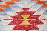 Vintage kilim rug in room decor setting, old rug, antique rug, pastel colors, faded colors, Turkish rug, vintage rug, soft rug, Portland, Oregon, rug store, rug shop, local shop,  antique kilim rug, bold colors, bright colors, faded colors