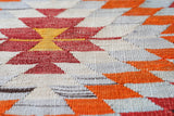 Vintage kilim rug in room decor setting, old rug, antique rug, pastel colors, faded colors, Turkish rug, vintage rug, soft rug, Portland, Oregon, rug store, rug shop, local shop,  antique kilim rug, bold colors, bright colors, faded colors