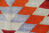 Vintage kilim rug in room decor setting, old rug, antique rug, pastel colors, faded colors, Turkish rug, vintage rug, soft rug, Portland, Oregon, rug store, rug shop, local shop,  antique kilim rug, bold colors, bright colors, faded colors