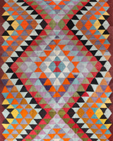 Vintage kilim rug in room decor setting, old rug, antique rug, pastel colors, faded colors, Turkish rug, vintage rug, soft rug, Portland, Oregon, rug store, rug shop, local shop,  antique kilim rug, bold colors, bright colors, faded colors