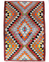 Vintage kilim rug in room decor setting, old rug, antique rug, pastel colors, faded colors, Turkish rug, vintage rug, soft rug, Portland, Oregon, rug store, rug shop, local shop,  antique kilim rug, bold colors, bright colors, faded colors