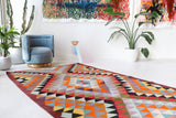 Vintage kilim rug in room decor setting, old rug, antique rug, pastel colors, faded colors, Turkish rug, vintage rug, soft rug, Portland, Oregon, rug store, rug shop, local shop,  antique kilim rug, bold colors, bright colors, faded colors