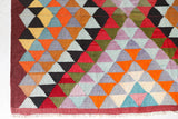 Vintage kilim rug in room decor setting, old rug, antique rug, pastel colors, faded colors, Turkish rug, vintage rug, soft rug, Portland, Oregon, rug store, rug shop, local shop,  antique kilim rug, bold colors, bright colors, faded colors