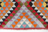 Vintage kilim rug in room decor setting, old rug, antique rug, pastel colors, faded colors, Turkish rug, vintage rug, soft rug, Portland, Oregon, rug store, rug shop, local shop,  antique kilim rug, bold colors, bright colors, faded colors