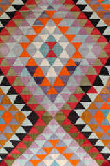 Vintage kilim rug in room decor setting, old rug, antique rug, pastel colors, faded colors, Turkish rug, vintage rug, soft rug, Portland, Oregon, rug store, rug shop, local shop,  antique kilim rug, bold colors, bright colors, faded colors