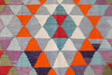 Vintage kilim rug in room decor setting, old rug, antique rug, pastel colors, faded colors, Turkish rug, vintage rug, soft rug, Portland, Oregon, rug store, rug shop, local shop,  antique kilim rug, bold colors, bright colors, faded colors