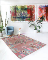 Vintage kilim rug in room decor setting, old rug, antique rug, pastel colors, faded colors, Turkish rug, vintage rug, soft rug, Portland, Oregon, rug store, rug shop, local shop,  antique kilim rug, bold colors, bright colors, faded colors