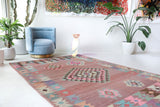 Vintage kilim rug in room decor setting, old rug, antique rug, pastel colors, faded colors, Turkish rug, vintage rug, soft rug, Portland, Oregon, rug store, rug shop, local shop,  antique kilim rug, bold colors, bright colors, faded colors