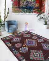Vintage kilim rug in room decor setting, old rug, antique rug, pastel colors, faded colors, Turkish rug, vintage rug, soft rug, Portland, Oregon, rug store, rug shop, local shop,  antique kilim rug, bold colors, bright colors, faded colors