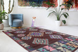 Vintage kilim rug in room decor setting, old rug, antique rug, pastel colors, faded colors, Turkish rug, vintage rug, soft rug, Portland, Oregon, rug store, rug shop, local shop,  antique kilim rug, bold colors, bright colors, faded colors