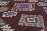 Vintage kilim rug in room decor setting, old rug, antique rug, pastel colors, faded colors, Turkish rug, vintage rug, soft rug, Portland, Oregon, rug store, rug shop, local shop,  antique kilim rug, bold colors, bright colors, faded colors