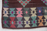 Vintage kilim rug in room decor setting, old rug, antique rug, pastel colors, faded colors, Turkish rug, vintage rug, soft rug, Portland, Oregon, rug store, rug shop, local shop,  antique kilim rug, bold colors, bright colors, faded colors