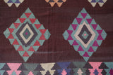 Vintage kilim rug in room decor setting, old rug, antique rug, pastel colors, faded colors, Turkish rug, vintage rug, soft rug, Portland, Oregon, rug store, rug shop, local shop,  antique kilim rug, bold colors, bright colors, faded colors