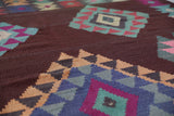 Vintage kilim rug in room decor setting, old rug, antique rug, pastel colors, faded colors, Turkish rug, vintage rug, soft rug, Portland, Oregon, rug store, rug shop, local shop,  antique kilim rug, bold colors, bright colors, faded colors