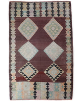 Vintage kilim rug in room decor setting, old rug, antique rug, pastel colors, faded colors, Turkish rug, vintage rug, soft rug, Portland, Oregon, rug store, rug shop, local shop,  antique kilim rug, bold colors, bright colors, faded colors