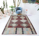 Vintage kilim rug in room decor setting, old rug, antique rug, pastel colors, faded colors, Turkish rug, vintage rug, soft rug, Portland, Oregon, rug store, rug shop, local shop,  antique kilim rug, bold colors, bright colors, faded colors