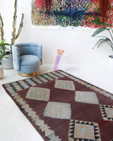 Vintage kilim rug in room decor setting, old rug, antique rug, pastel colors, faded colors, Turkish rug, vintage rug, soft rug, Portland, Oregon, rug store, rug shop, local shop,  antique kilim rug, bold colors, bright colors, faded colors