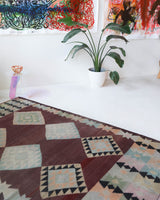 Vintage kilim rug in room decor setting, old rug, antique rug, pastel colors, faded colors, Turkish rug, vintage rug, soft rug, Portland, Oregon, rug store, rug shop, local shop,  antique kilim rug, bold colors, bright colors, faded colors