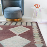 Vintage kilim rug in room decor setting, old rug, antique rug, pastel colors, faded colors, Turkish rug, vintage rug, soft rug, Portland, Oregon, rug store, rug shop, local shop,  antique kilim rug, bold colors, bright colors, faded colors