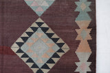 Vintage kilim rug in room decor setting, old rug, antique rug, pastel colors, faded colors, Turkish rug, vintage rug, soft rug, Portland, Oregon, rug store, rug shop, local shop,  antique kilim rug, bold colors, bright colors, faded colors