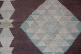 Vintage kilim rug in room decor setting, old rug, antique rug, pastel colors, faded colors, Turkish rug, vintage rug, soft rug, Portland, Oregon, rug store, rug shop, local shop,  antique kilim rug, bold colors, bright colors, faded colors