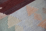 Vintage kilim rug in room decor setting, old rug, antique rug, pastel colors, faded colors, Turkish rug, vintage rug, soft rug, Portland, Oregon, rug store, rug shop, local shop,  antique kilim rug, bold colors, bright colors, faded colors