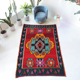 Vintage kilim rug in living room setting, bright colors, wild shaman, soft rug, bold color, Portland, Oregon, rug store, rug shop, local shop, vintage rug, modern kilim, warm colors, antique rug, antique kilim